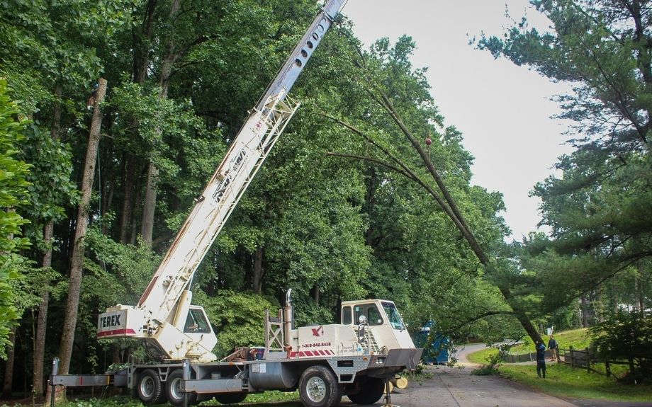 The crane used by Riverbend Landscapes & Tree Service for tree removals