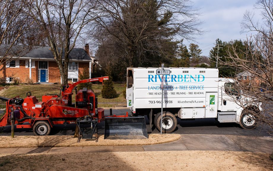 Riverbend truck and chipper on a Virginia residential street during the winter months.